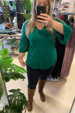 Load image into Gallery viewer, Green bell sleeve blouses in Bamboo fabric Canadian made clothing
Made in Canada!
Canadian retail store
Canadian clothing near me