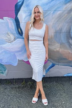 Load image into Gallery viewer, Pencil skirt with side slits in a ribbed bamboo fabric.Sustainable bamboo clothing made in Vancouver BC. Eco friendly fabrics. Eco conscious fashion collection made in Vancouver BC. Most popular for fit and quality bamboo clothing made locally in Vancouver BC