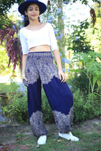 Load image into Gallery viewer, Blue Harem Pants with White Designs and Pocket. High Smocked Waist.  Fits variety of sizes.
