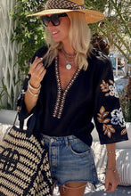 Load image into Gallery viewer, Black floral embroidered long sleeved loose fitting blouse. Bohemian vibes.
