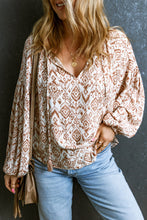 Load image into Gallery viewer, Western print balloon sleeve tassel blouse from fraser valley British Columbia. Fun print lounge wear long sleeve top from Abbotsford B.C. White/brown print vacation wear from small canadian business.  Bohemian and summer vibes.
