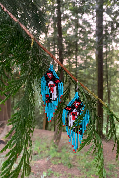 Native beadwork in Fraser Valley BC

Indigenous art near me
Quality indigenous beaded earrings near me
Teal blue one of a kind Orca earrings First Nations made. 
Handmade quality beadwork by First Nations artists from Fraser valley bc