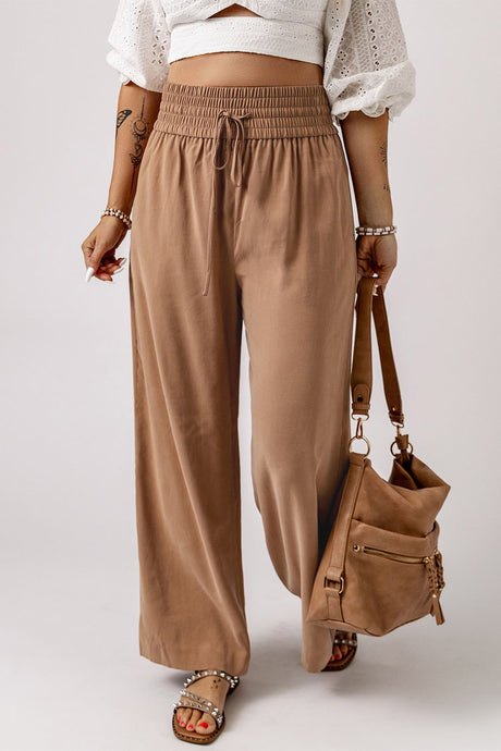 Beige brown lounge wear casual wide leg pants from fraser valley British columbia. Tan high waisted vacation wear pants from small canadian business. Coffee coloured Bohemian and summer vibe pants.. 