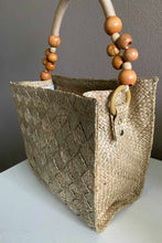 Load image into Gallery viewer, Beige Grass Reed Hand Bag with Bead Straps. Hand Made with Grass Reeds in the Philippines. Support Local Canadian Businesses.
