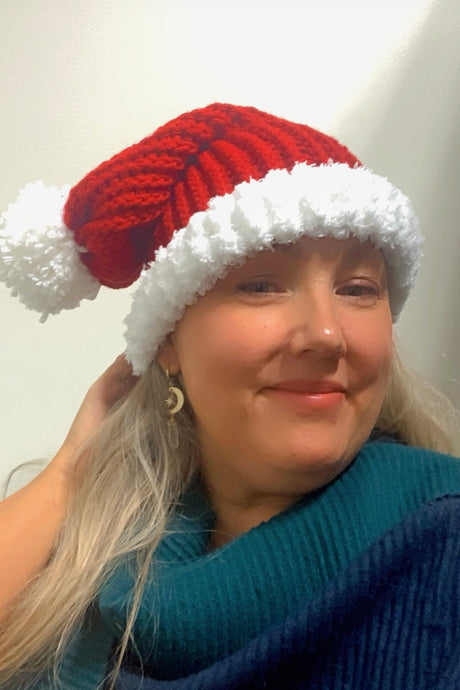 hand made with quality yarn. Santa hats extra soft white brim Santa hats n Abbotsford BC. Santa hats online. Bulk Santa hats. Santa hats ship anywhere in Canada. Best deal on local Santa knit hats for Christmas