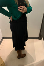 Load image into Gallery viewer, Flattering on all figures the bamboo skirt with tulip hem.
