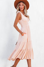 Load image into Gallery viewer, Casual Apricot Smocked Midi Dress . This light peach dress with pockets is perfect for the summer in Fraser Valley B.C. Works well for a beach cover up. Support your local small Canadian businesses in British Columbia
