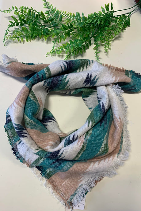 Aztec print scarf in green. Great accent piece for Fall. Pair with your favorite sweater and boots for this seasons coziest looks. Handmade locally. First nations artist from BC. Wool scarves make perfect gifts for holiday season too!